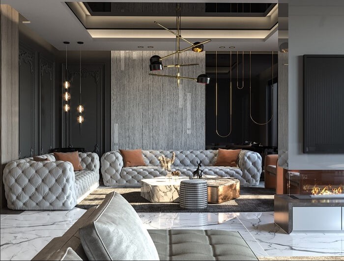 Bộ sofa xám với điểm nhấn của chiếc gối ôm cùng những đèn vàng le lói