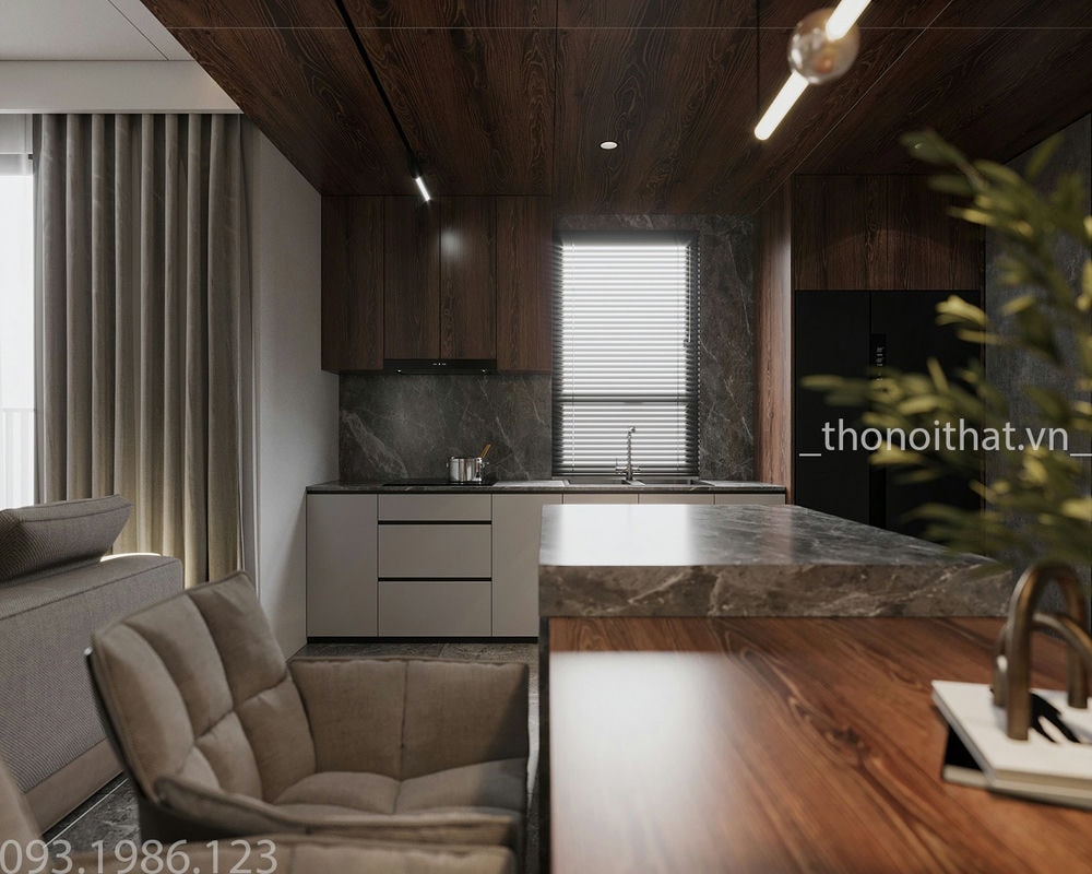 Từ bàn ăn đi vào là khu vực bếp được thiết kế rất nhỏ gọn và đầy đủ
