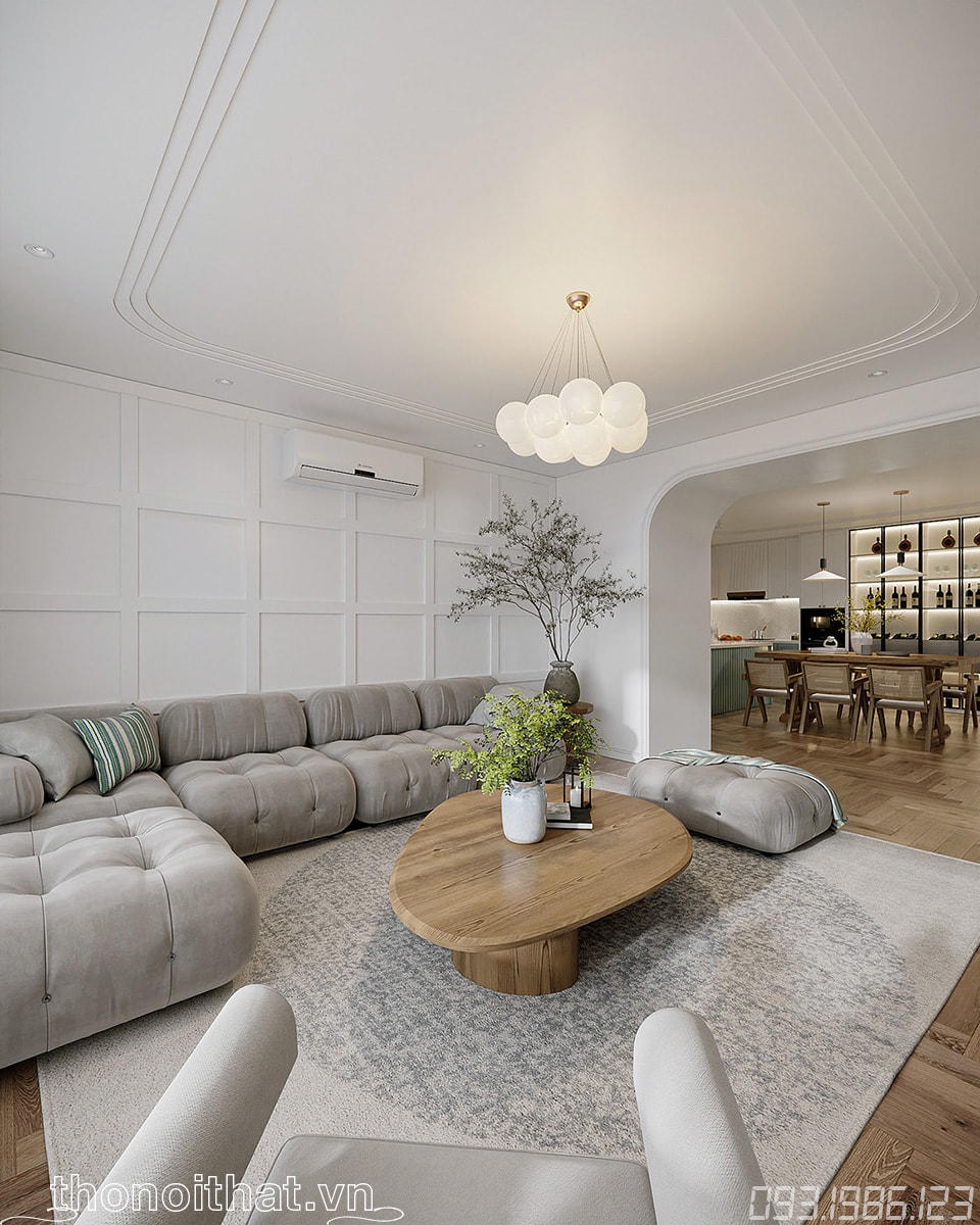 Một góc nhỏ bên sofa được thiết kế bàn nhỏ nhắn trang trí lọ hoa