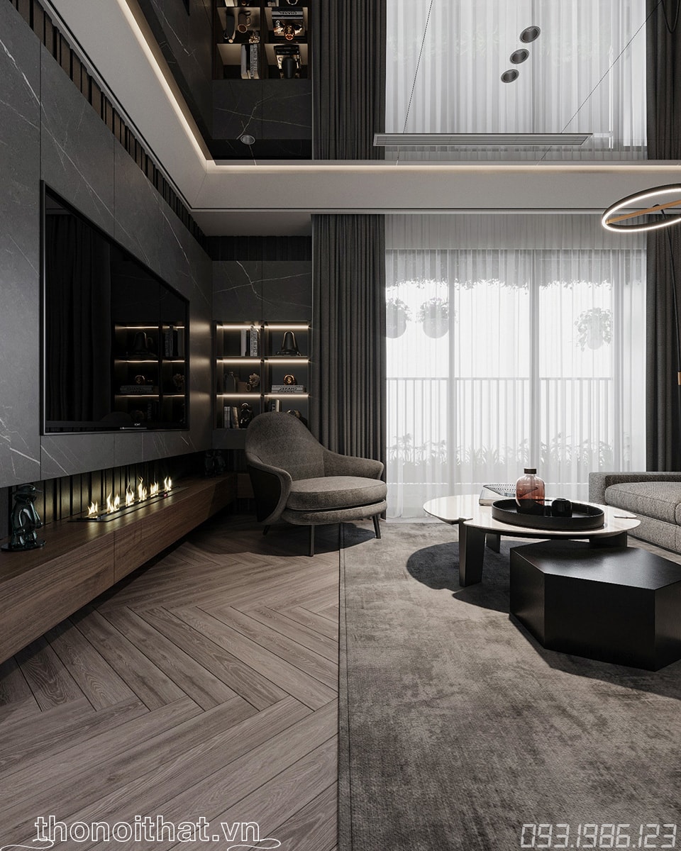 Chiếc ghế sofa đơn được thiết kế màu xám lông chuột với 3 chân nhỏ nhắn