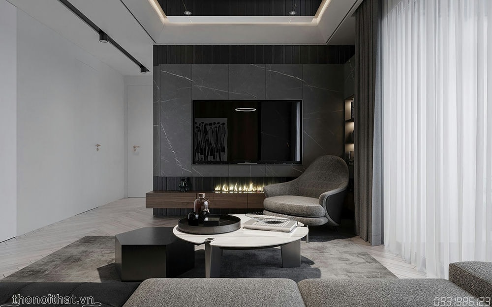 Từ sofa đến kệ tivi được trang trí đơn giản chỉ với bộ bàn tròn
