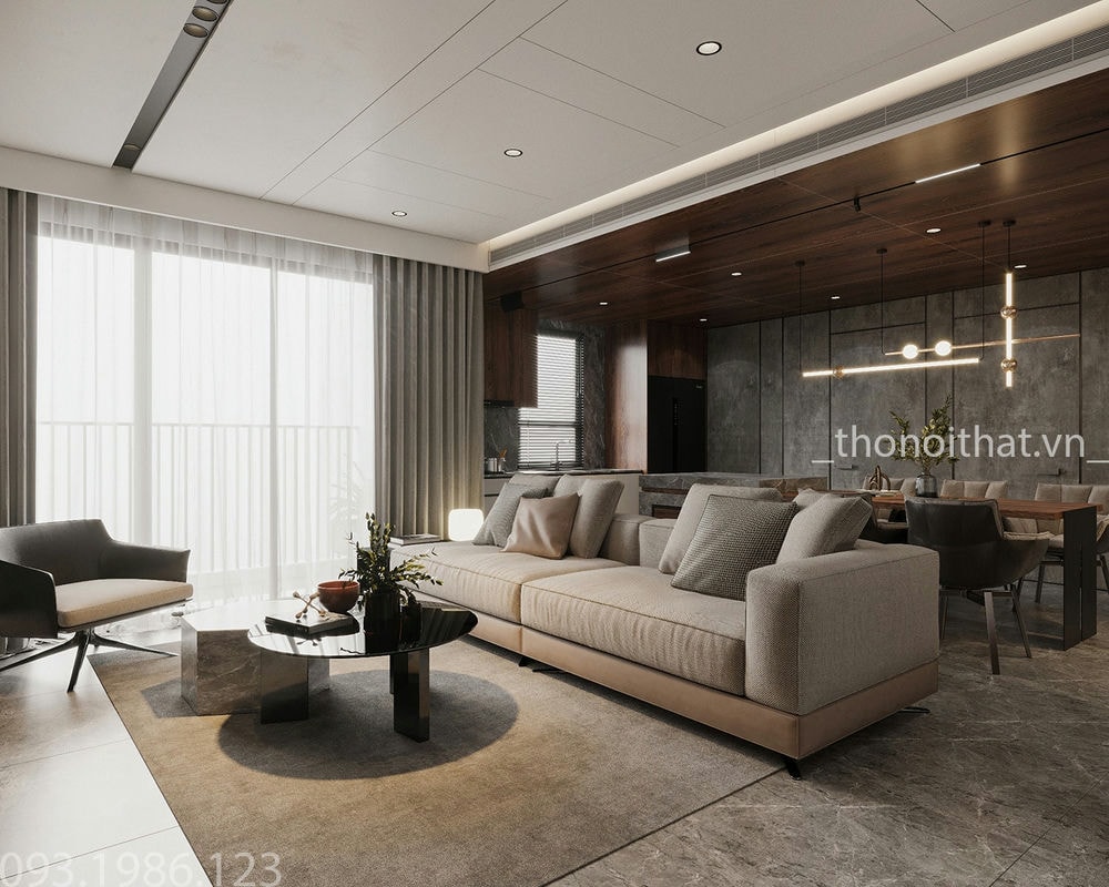 Chiếc ghế sofa màu nâu kem luôn là điểm nhấn chủ đạo nơi phòng khách với ánh đèn vàng