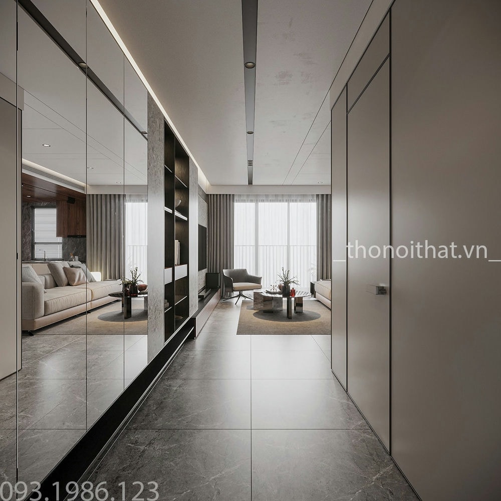 Lối đi vào phòng khách là khu vực tủ để đồ của các thành viên trong gia đình
