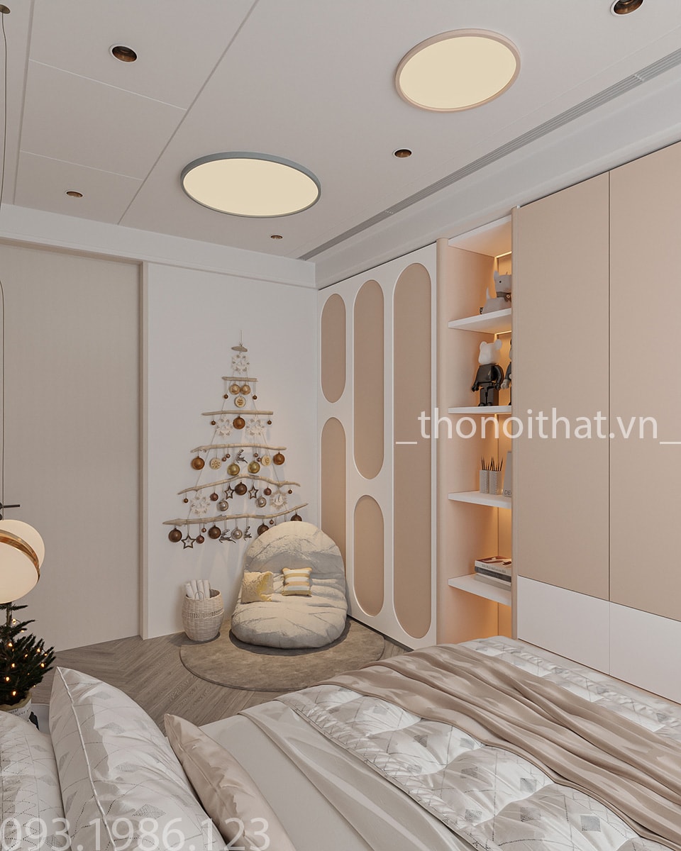 Bên cạnh đó được bố trí với chiếc ghế lười tại góc nhà cùng bức tường trang trí cây Noel