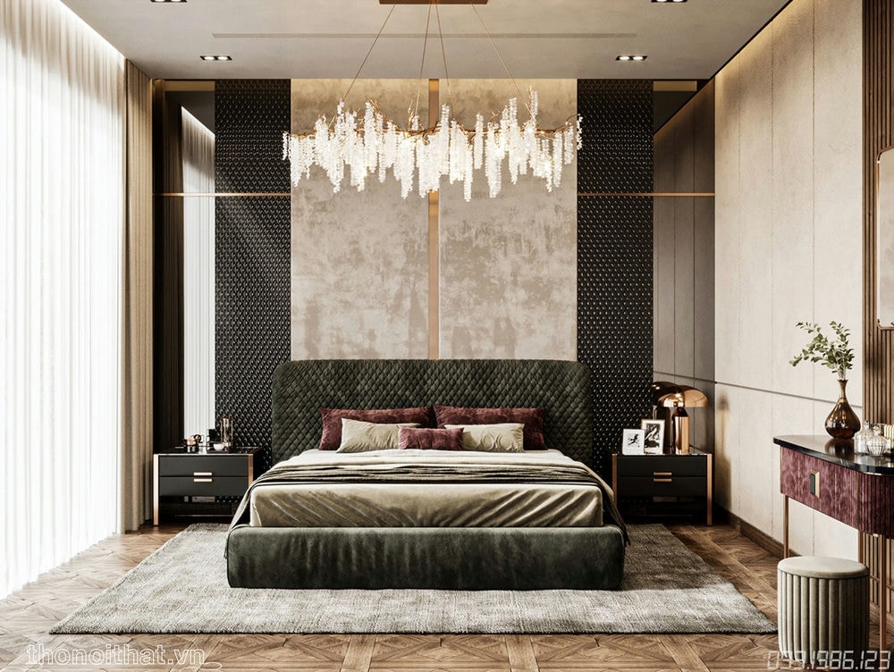 Chiếc giường đệm nỉ được đặt giữa phòng với màu đen làm chủ đạo
